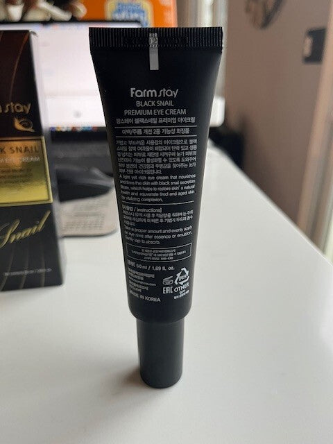 FARMSTAY Black Snail Premium Eye Brightener Cream Improve Appearance Of Wrinkles