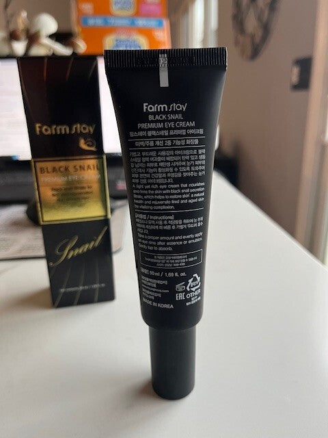 FARMSTAY Black Snail Premium Eye Brightener Cream Improve Appearance Of Wrinkles